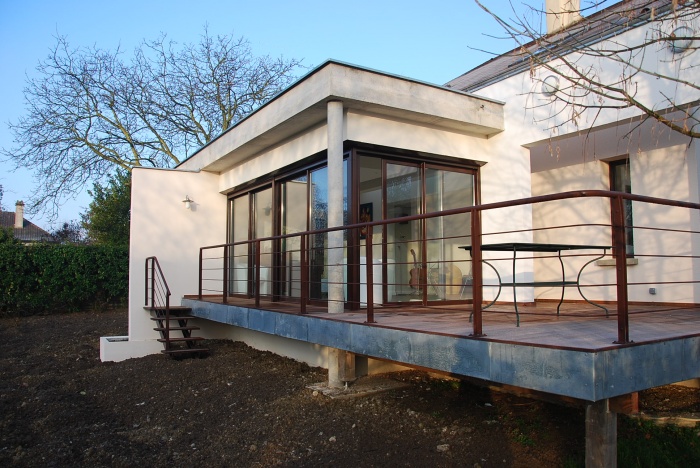 Extension d'une habitation et réfection des terrasses