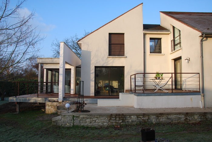 Extension d'une habitation et réfection des terrasses : .