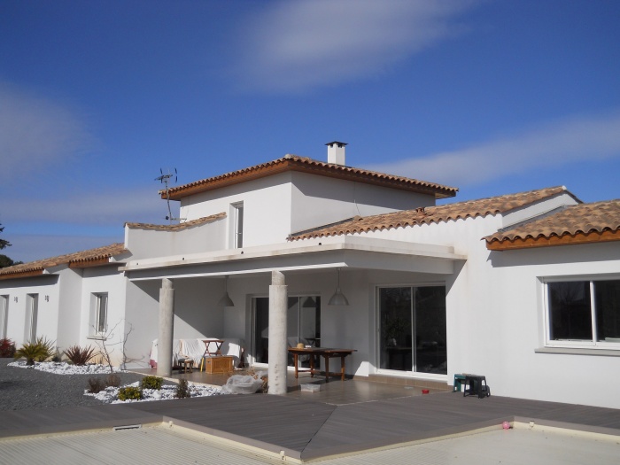 extension d'une maison en bois enduit et cr�ation d'une passerelle